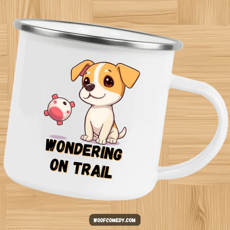 Funny camping mug with a curious dog tilting its head, eyes fixed on a floating squeaky toy.