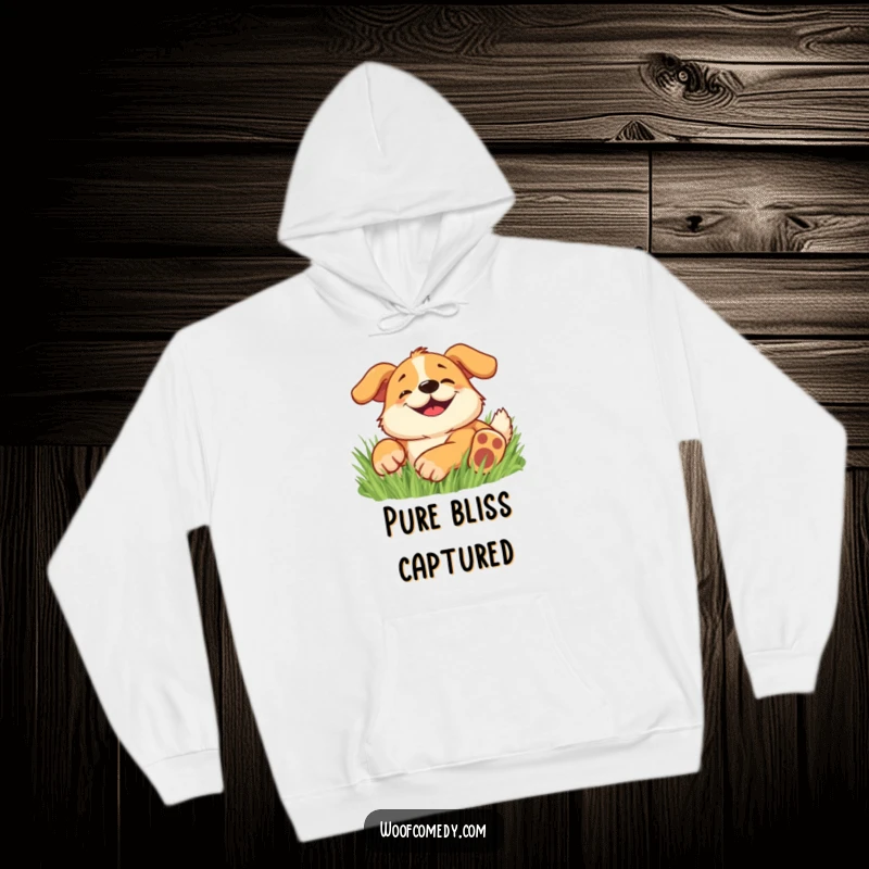 Funny hoodie featuring a happy dog with a wide, goofy grin, rolling around in soft grass.