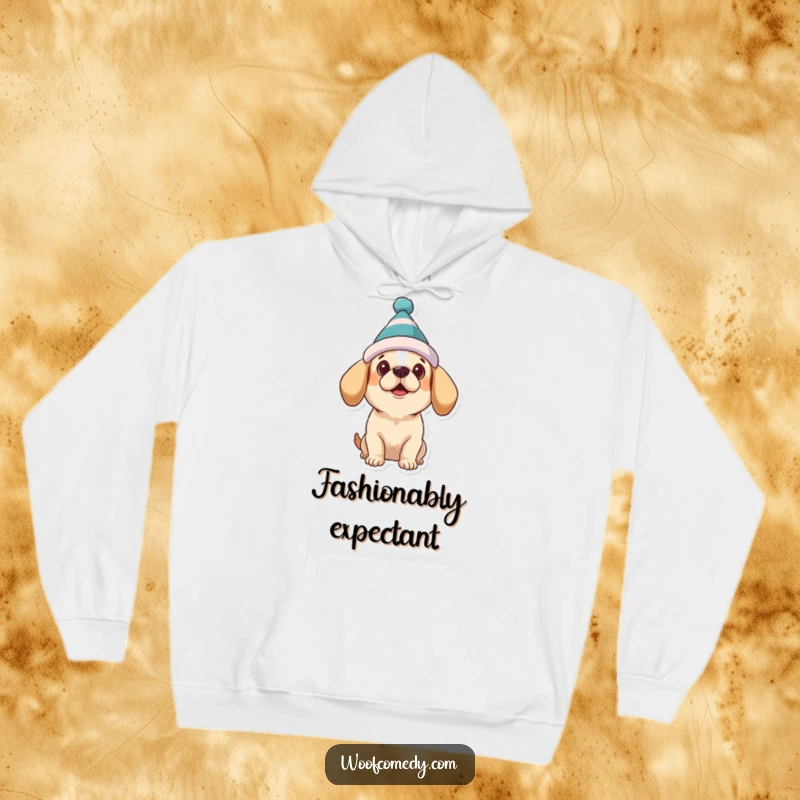 Funny dog hoodie featuring a dog wearing a silly hat, looking upward with sweet, expectant eyes.