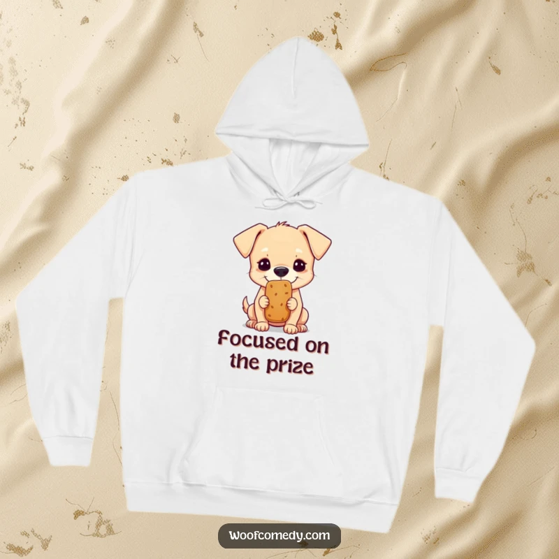 Funny hoodie with a small dog concentrating hard on balancing a treat on its nose, a cozy funny gift.