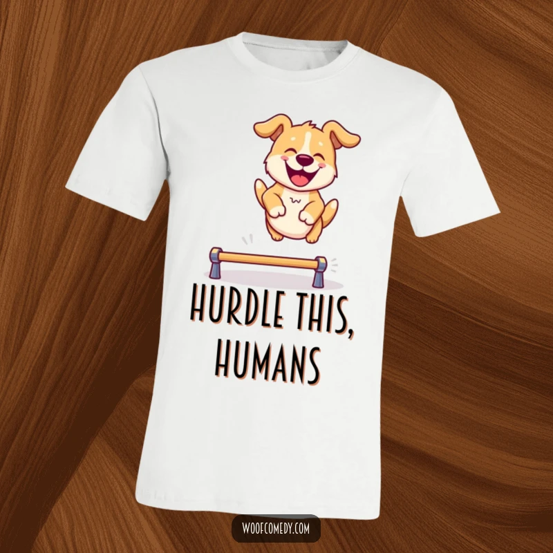 Funny t-shirt showcasing a dog gleefully leaping over an obstacle with cartoon-like energy and a big smile.