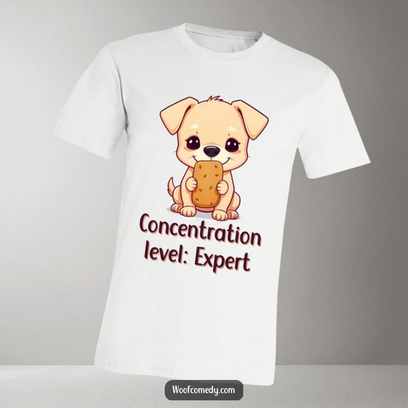 Funny t-shirt featuring a small dog focused on balancing a treat on its nose, a humorous gift idea.